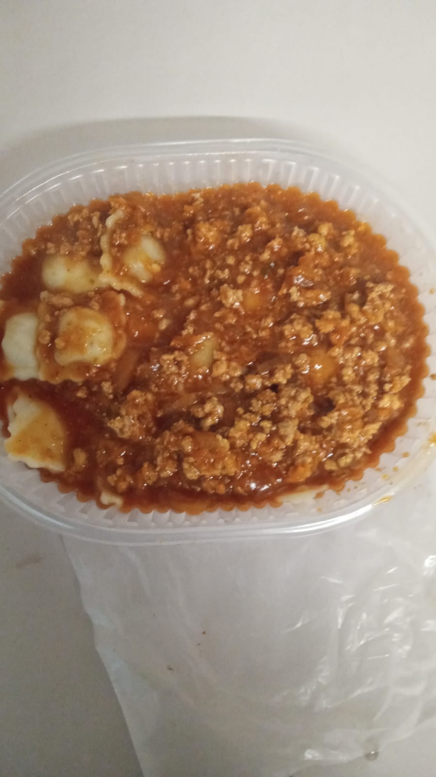 Ravioles con Salsa Bologñesa